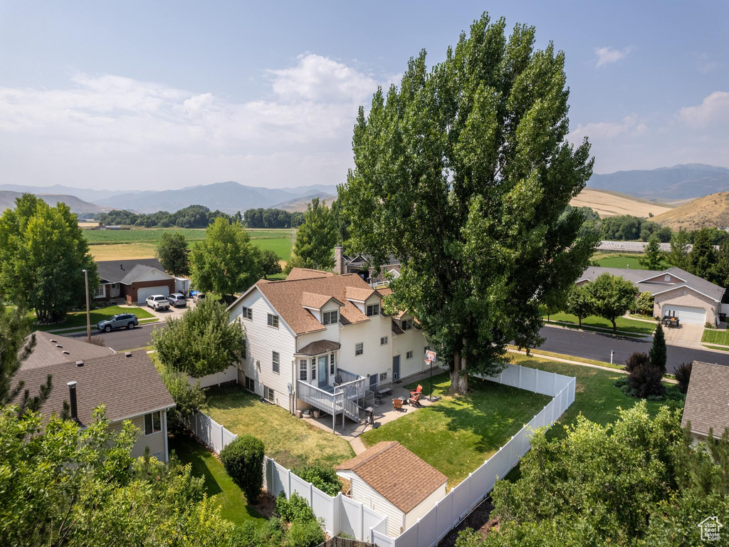 Birds eye view of property featuring a mountain view