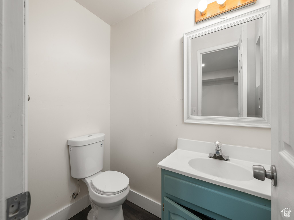 Bathroom with vanity and toilet