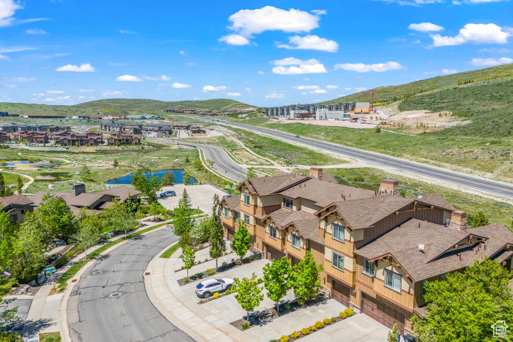 Birds eye view of property with a mountain view