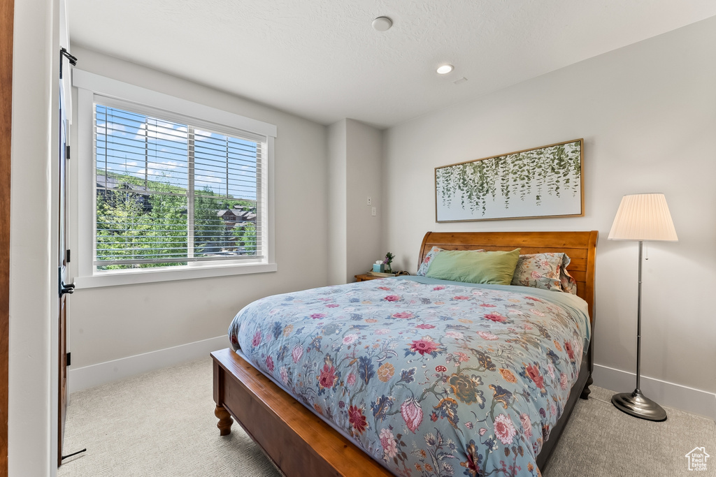 View of carpeted bedroom