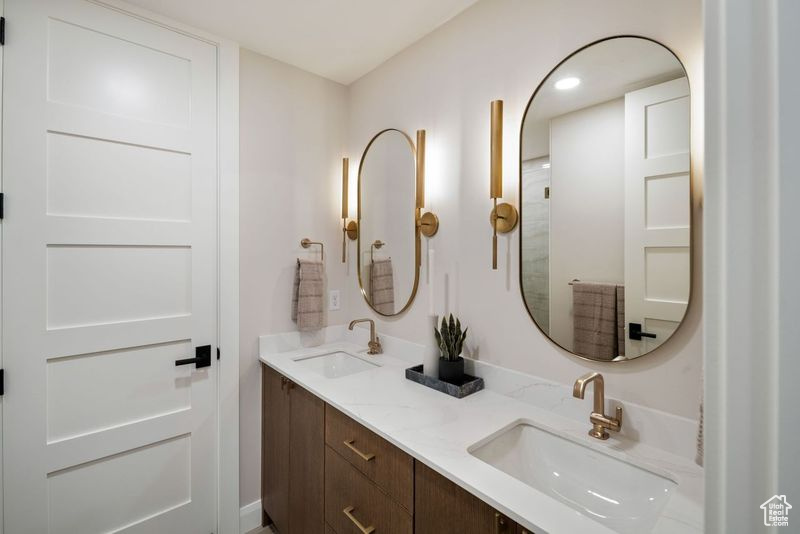 Bathroom featuring double vanity