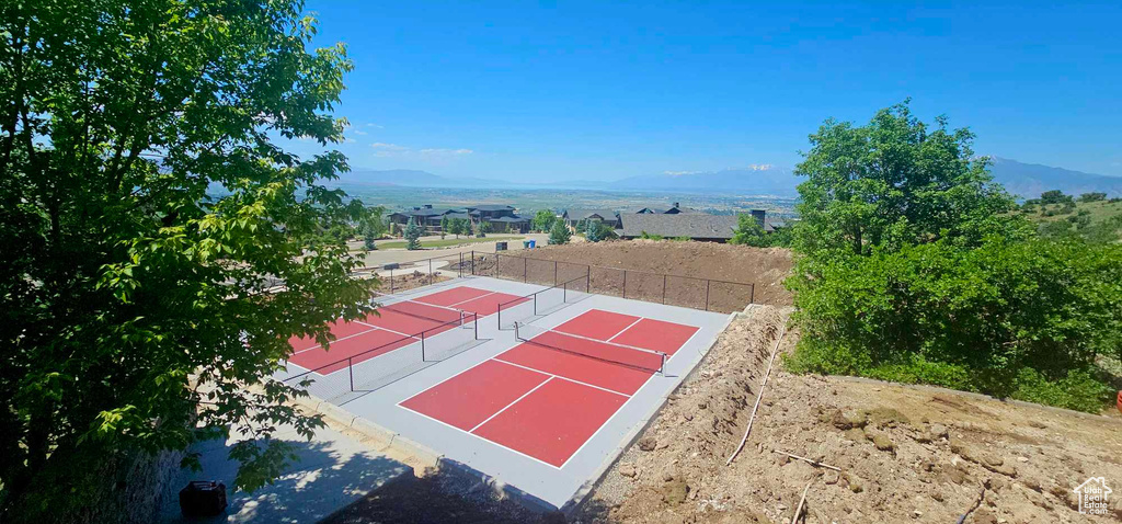 View of sport court with a mountain view