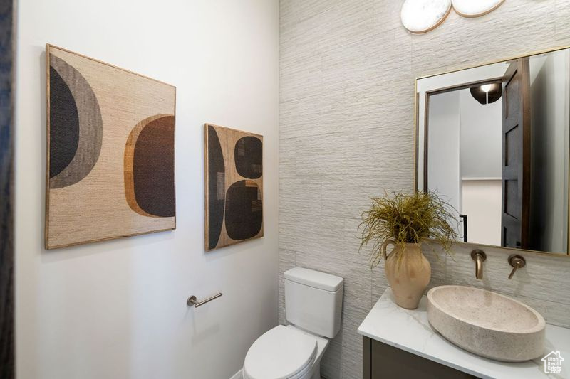 Bathroom with vanity and toilet