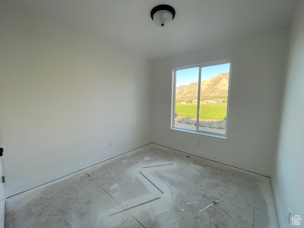 Spare room with a mountain view