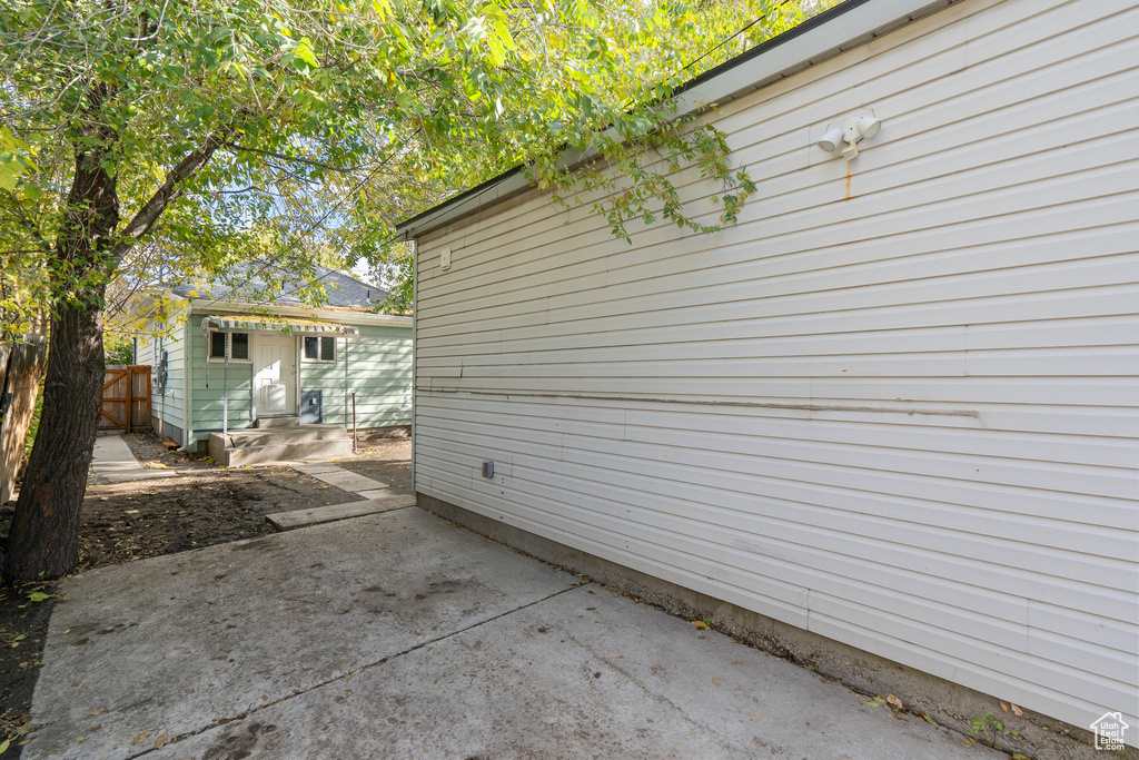 View of property exterior featuring a patio