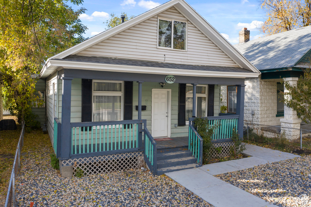 Bungalow-style house with covered porch