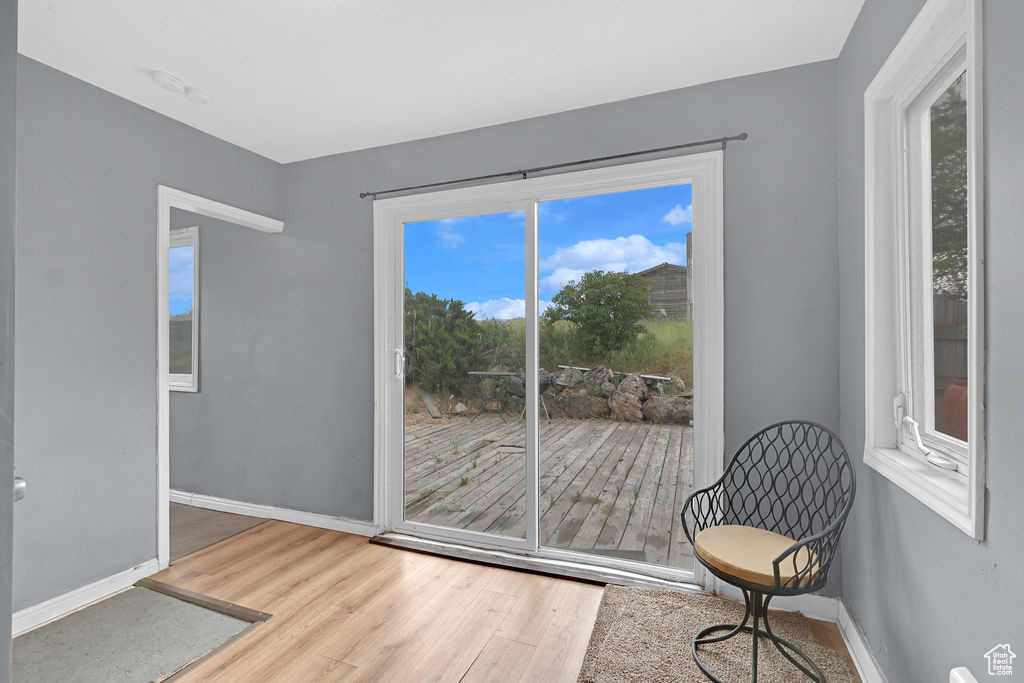 Sitting room featuring light wood-type flooring