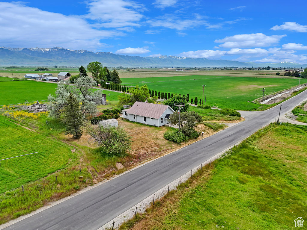 Drone / aerial view featuring a mountain view and a rural view