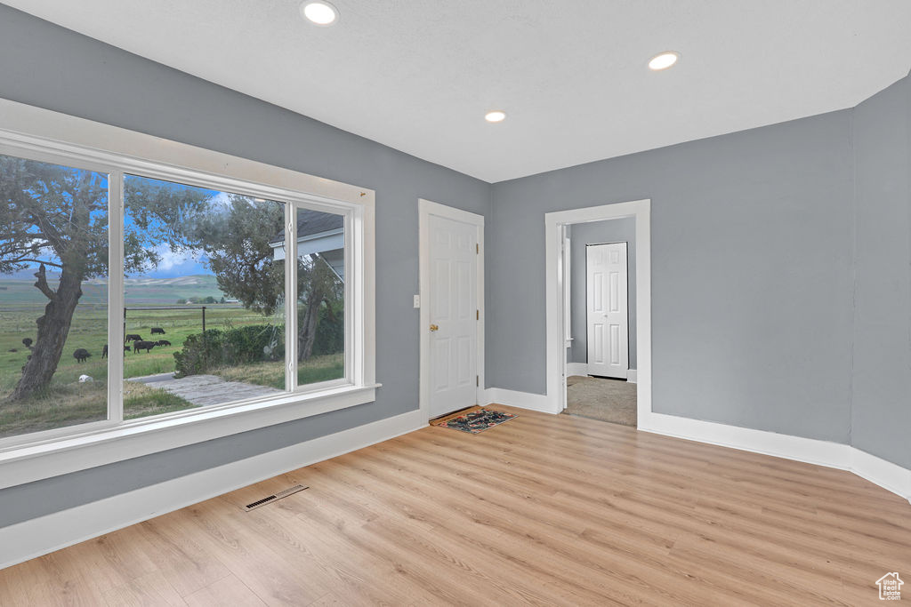 Spare room featuring light hardwood / wood-style floors