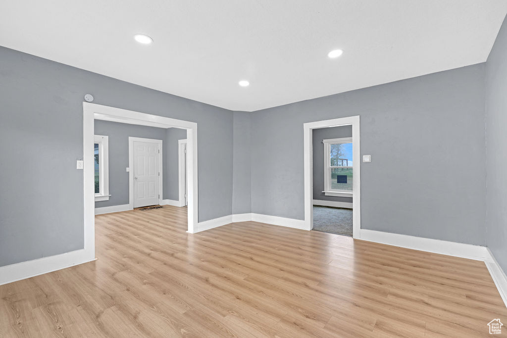 Spare room with light wood-type flooring