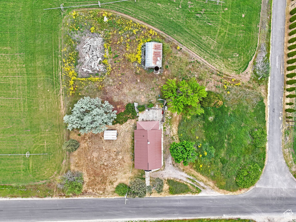 Birds eye view of property featuring a rural view