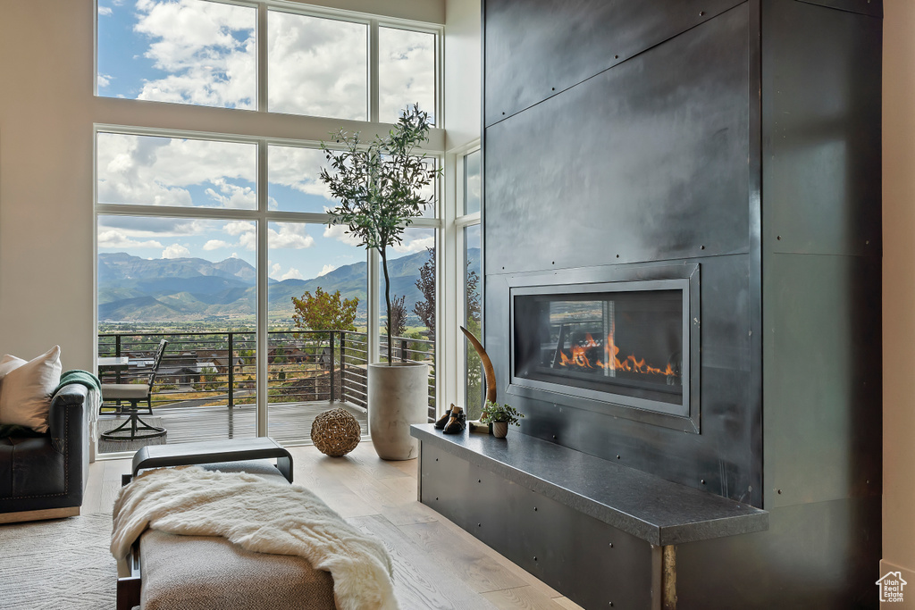 Sitting room featuring plenty of natural light and a mountain view