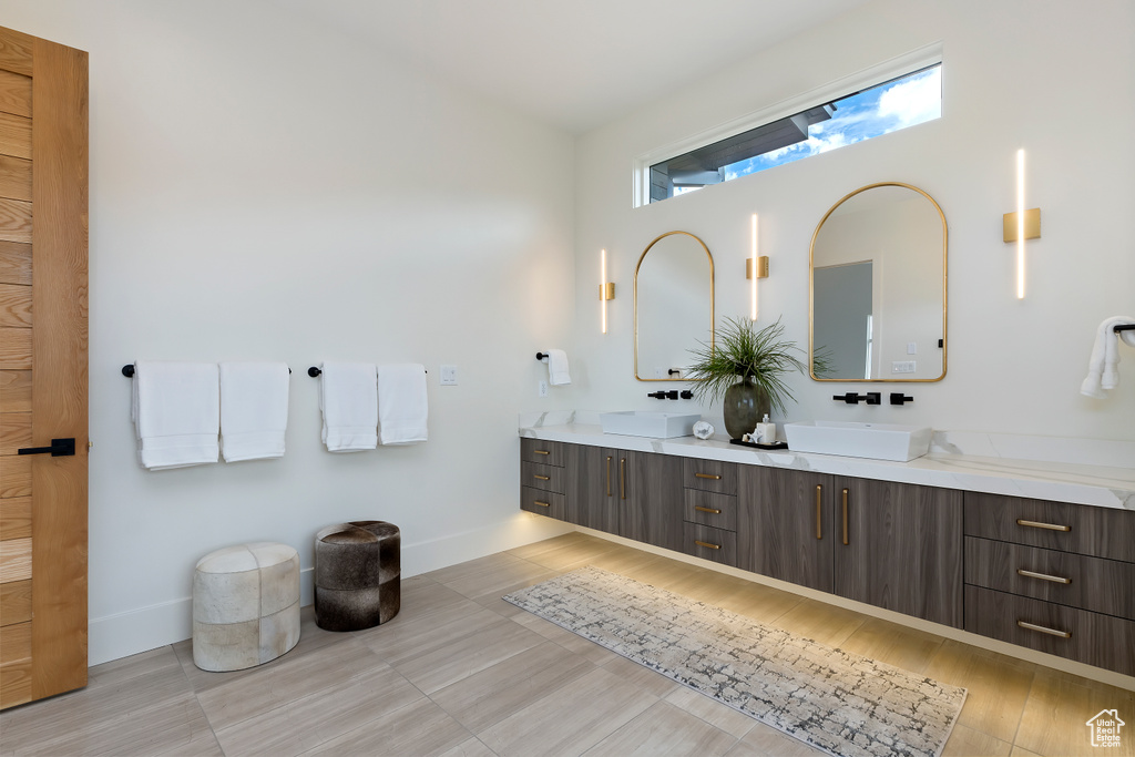 Bathroom featuring vanity and tile patterned floors