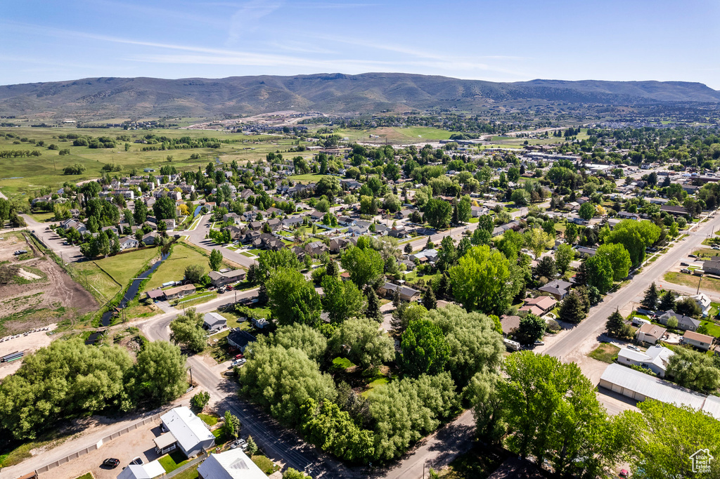 Birds eye view of property featuring a mountain view