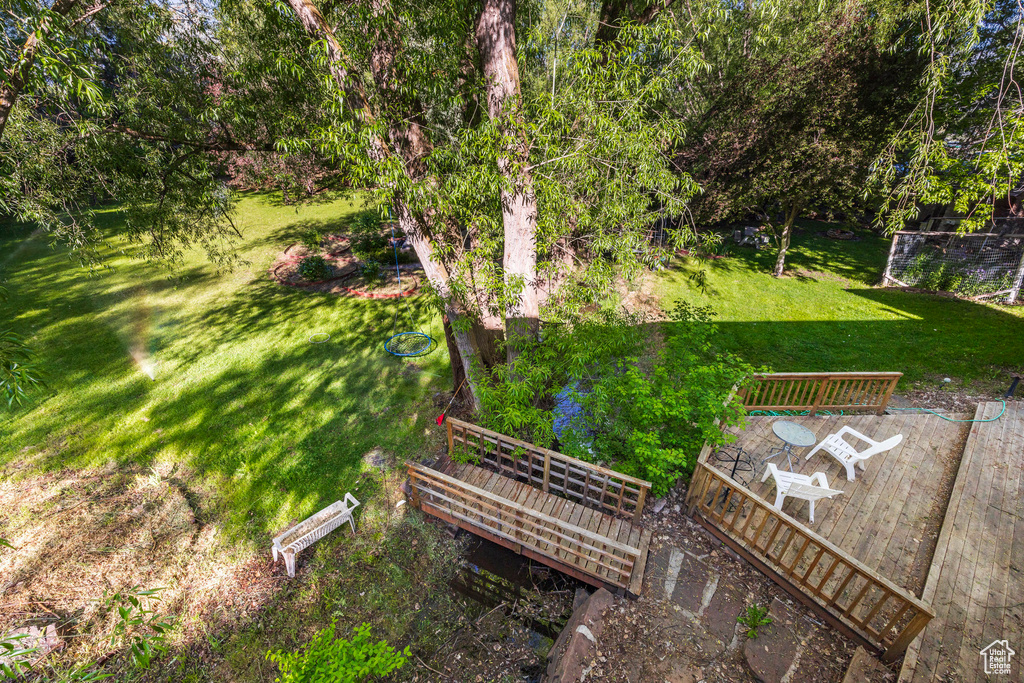 View of yard featuring a deck