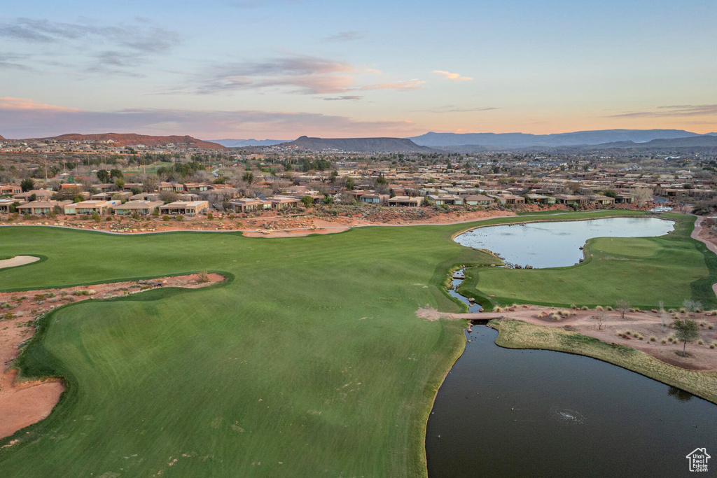 Aerial view at dusk with a water and mountain view