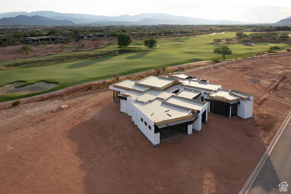 Birds eye view of property with a mountain view