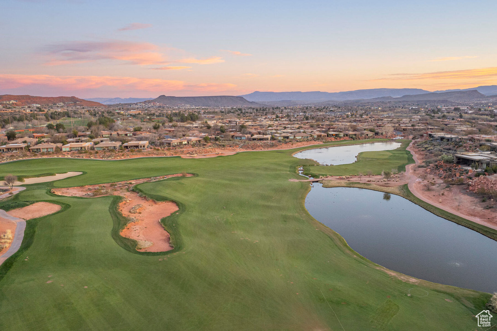 View of home's community featuring a water and mountain view