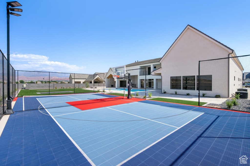 View of basketball court with tennis court