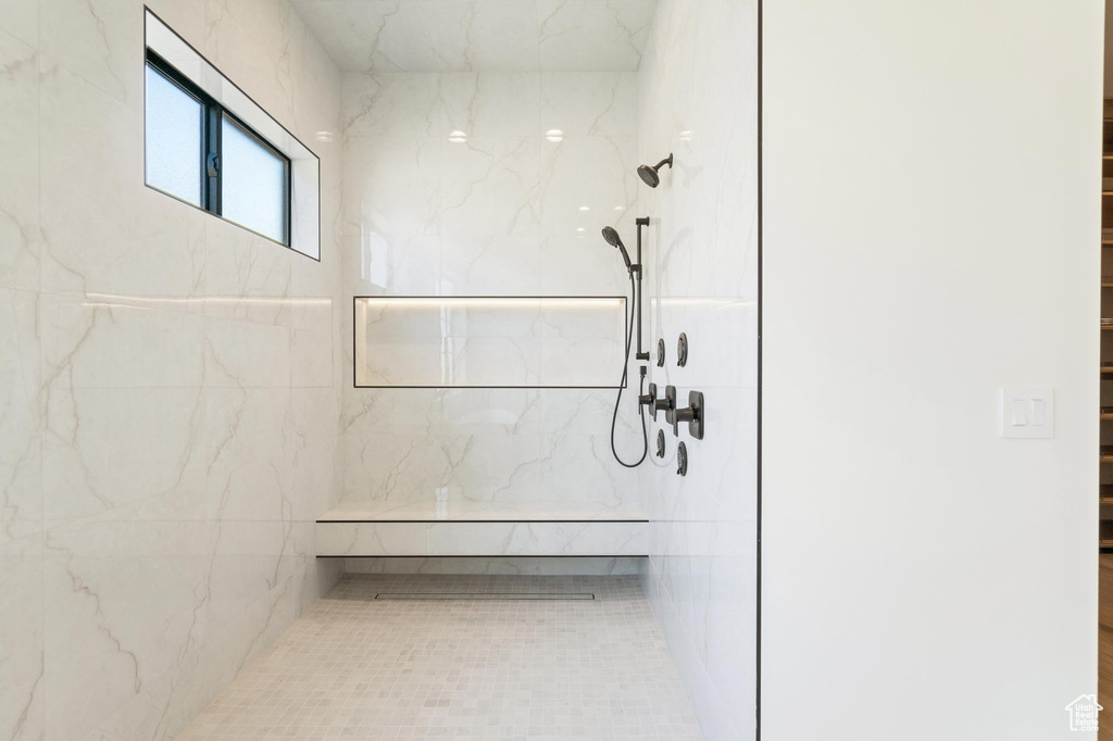 Bathroom with a tile shower