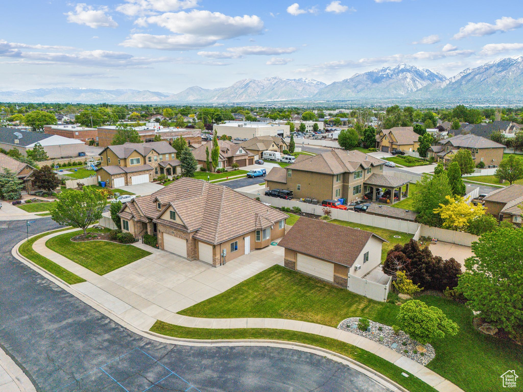 Birds eye view of property with a mountain view