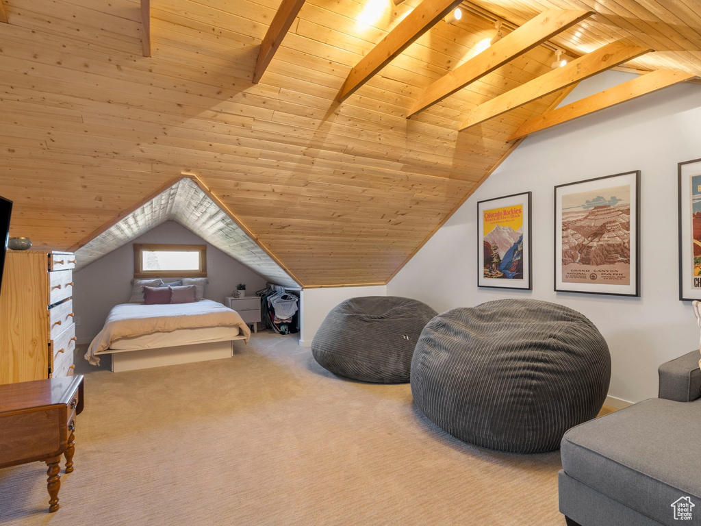 Bedroom with carpet flooring, wooden ceiling, and lofted ceiling with beams