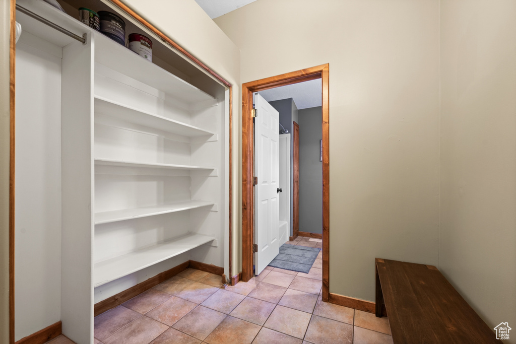 Interior space featuring light tile flooring