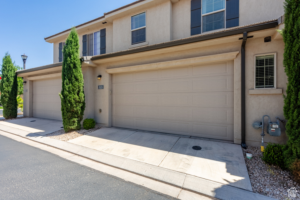 View of front of property featuring a garage