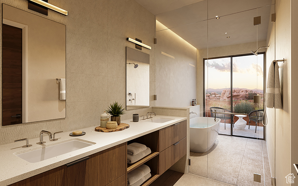 Bathroom with tile walls, double vanity, and tile floors