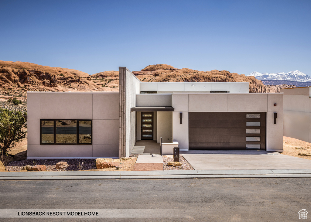 View of front of property with a mountain view