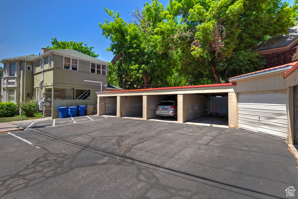 Exterior space featuring a carport