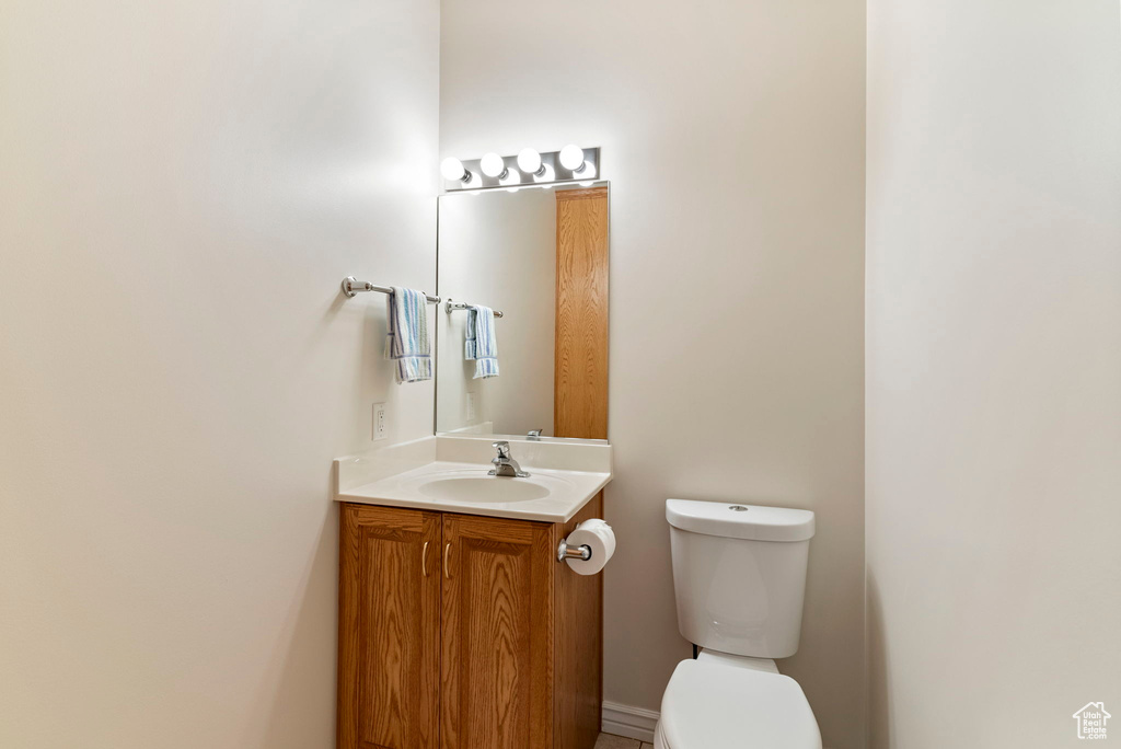 Bathroom with toilet and vanity