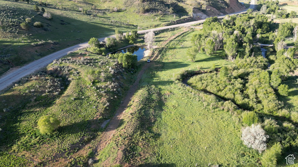 Birds eye view of property with a rural view