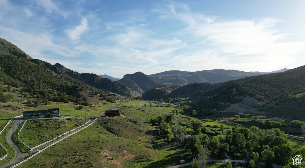 Property view of mountains with a rural view