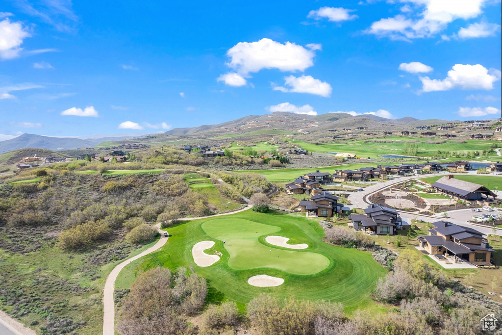 Birds eye view of property with a mountain view