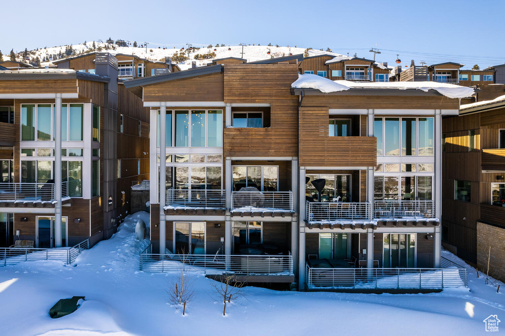 View of snow covered property