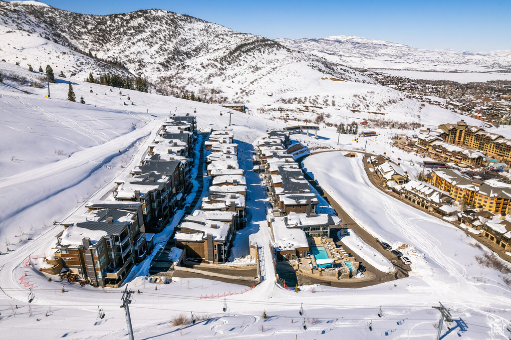 Snowy aerial view with a mountain view