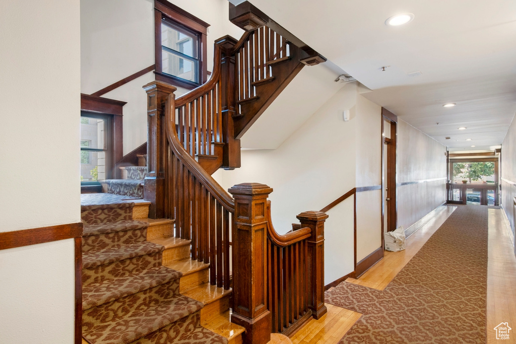 Stairs with hardwood / wood-style flooring