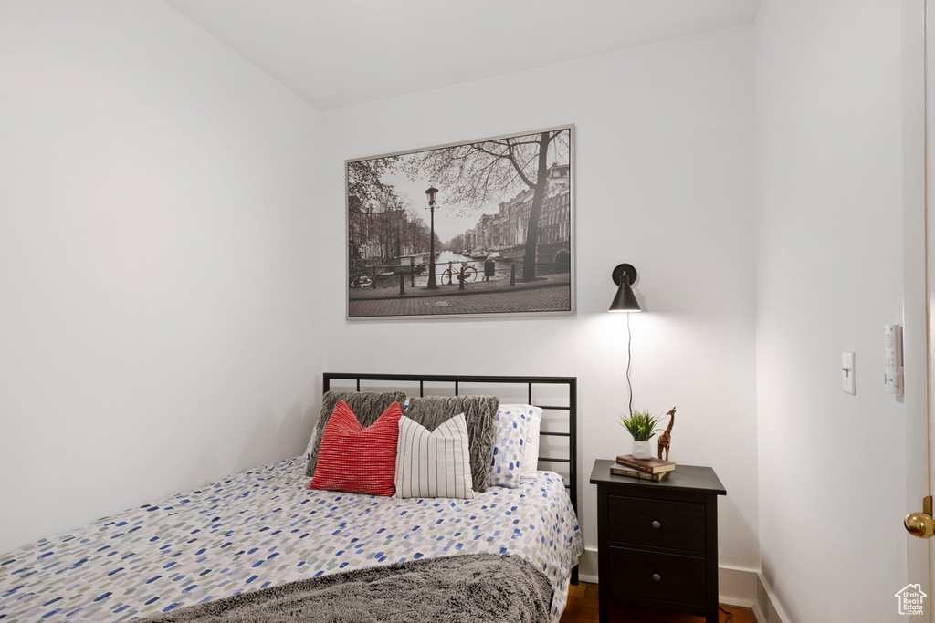 Bedroom featuring wood-type flooring