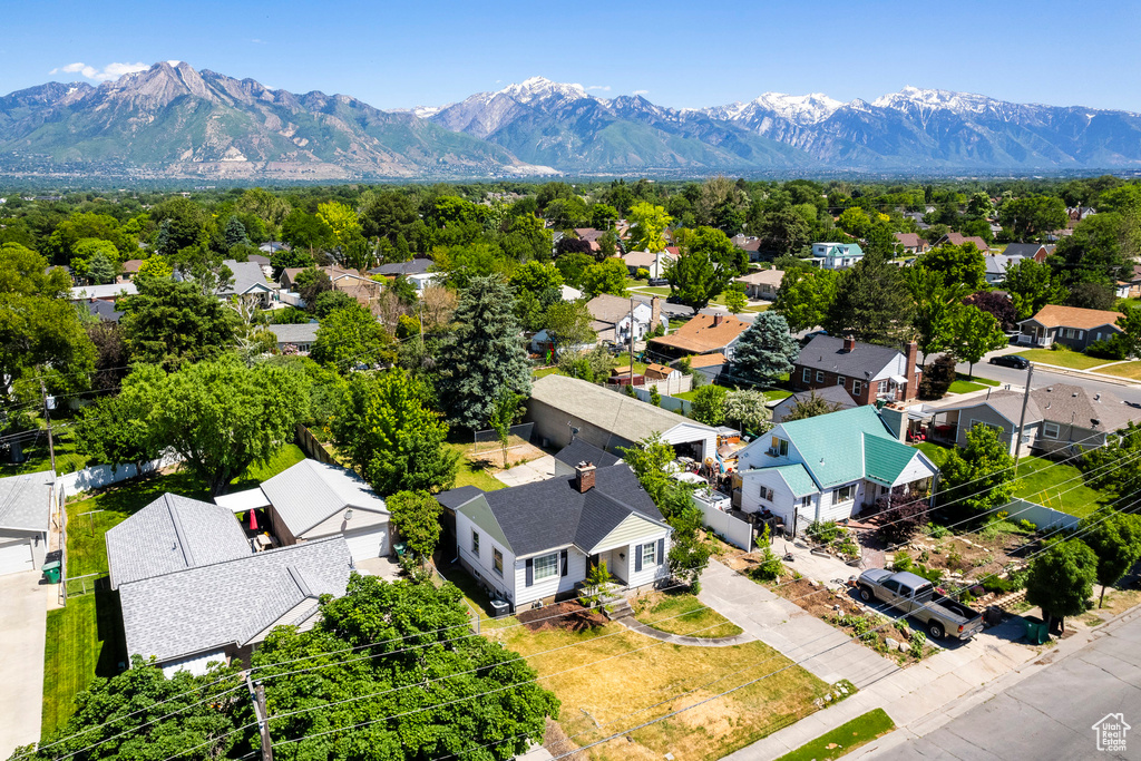 Birds eye view of property with a mountain view