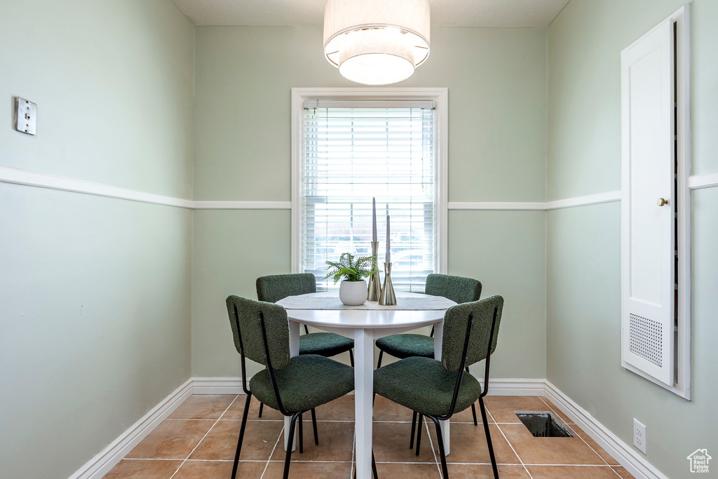 Dining area featuring tile patterned floors