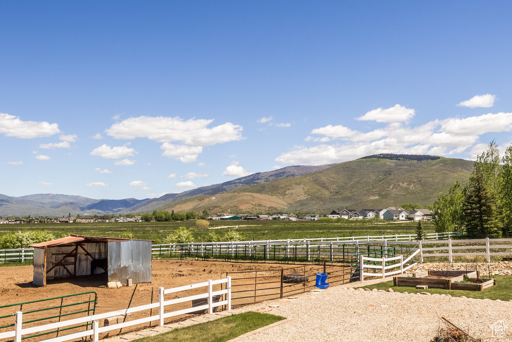 View of mountain feature with a rural view