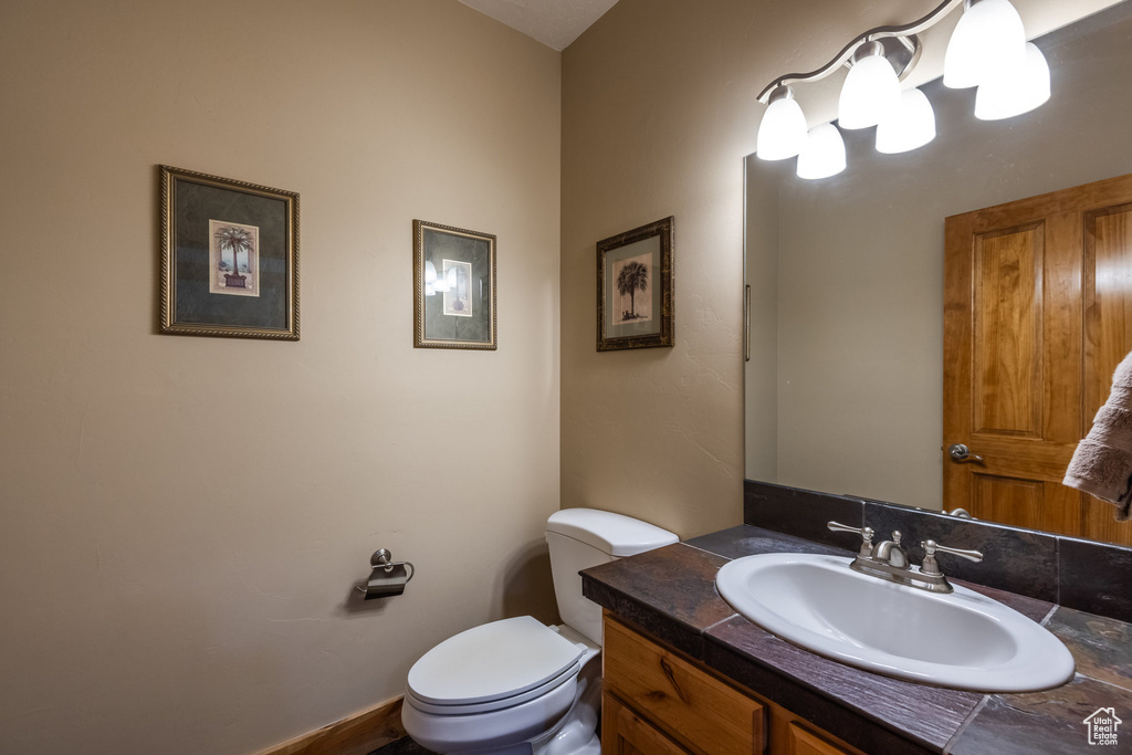 Bathroom with vanity and toilet