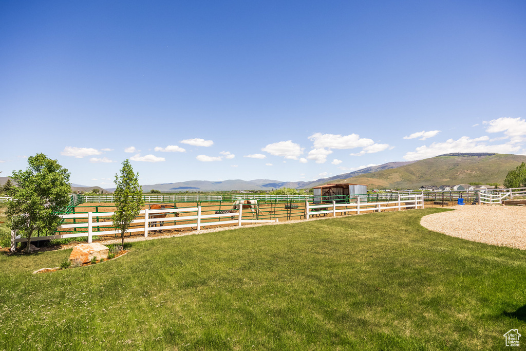 View of yard featuring a mountain view and a rural view