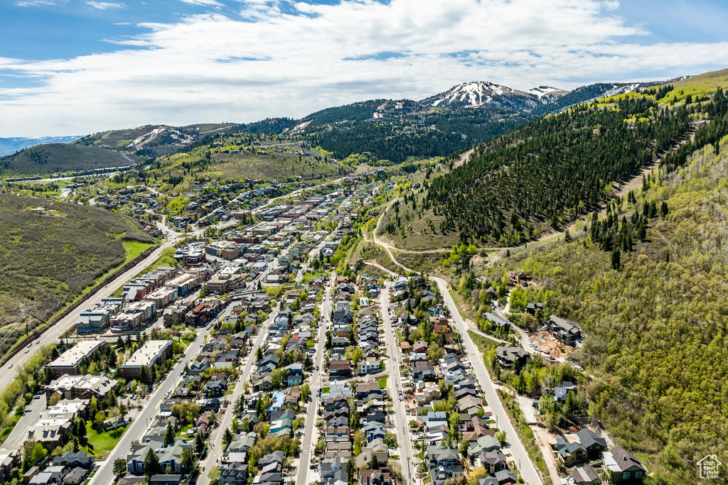 Birds eye view of property with a mountain view