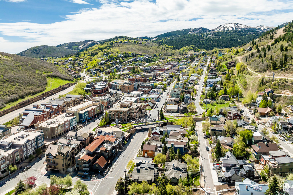 Birds eye view of property with a mountain view