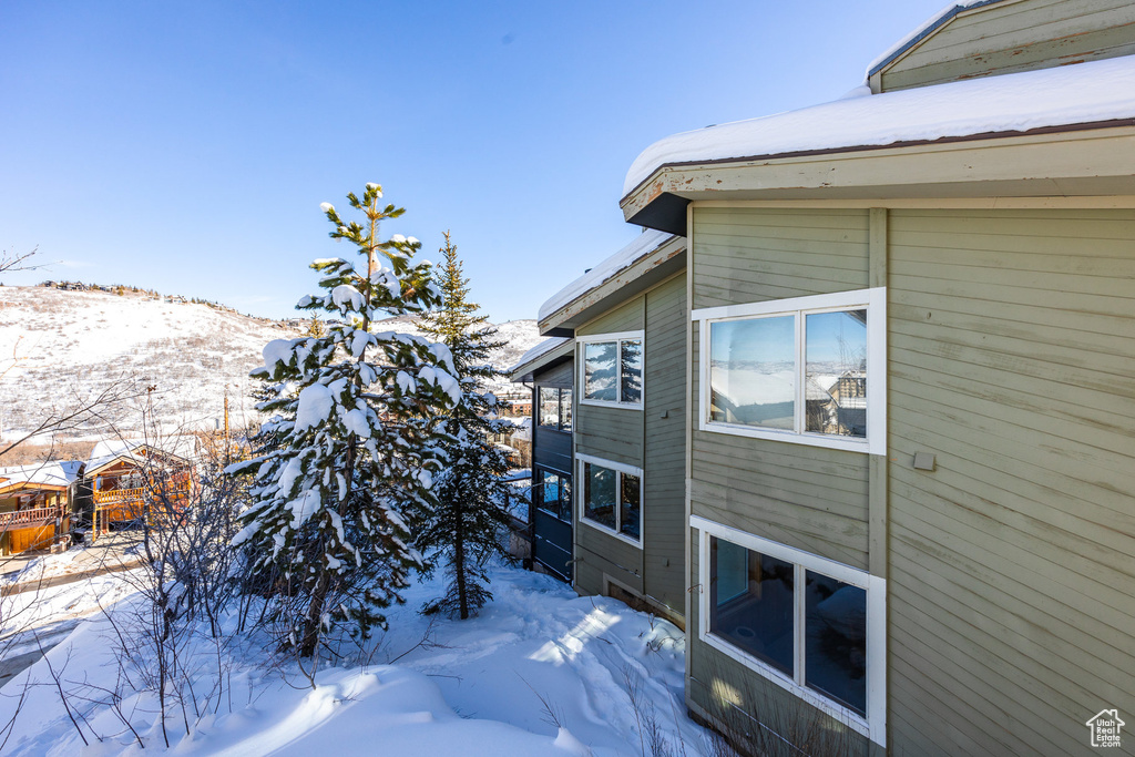 View of snow covered property