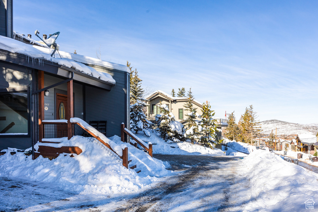 View of yard covered in snow