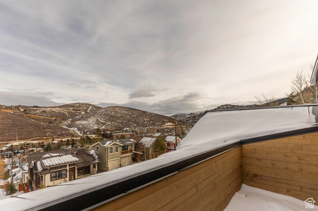 Balcony with a mountain view and a residential view