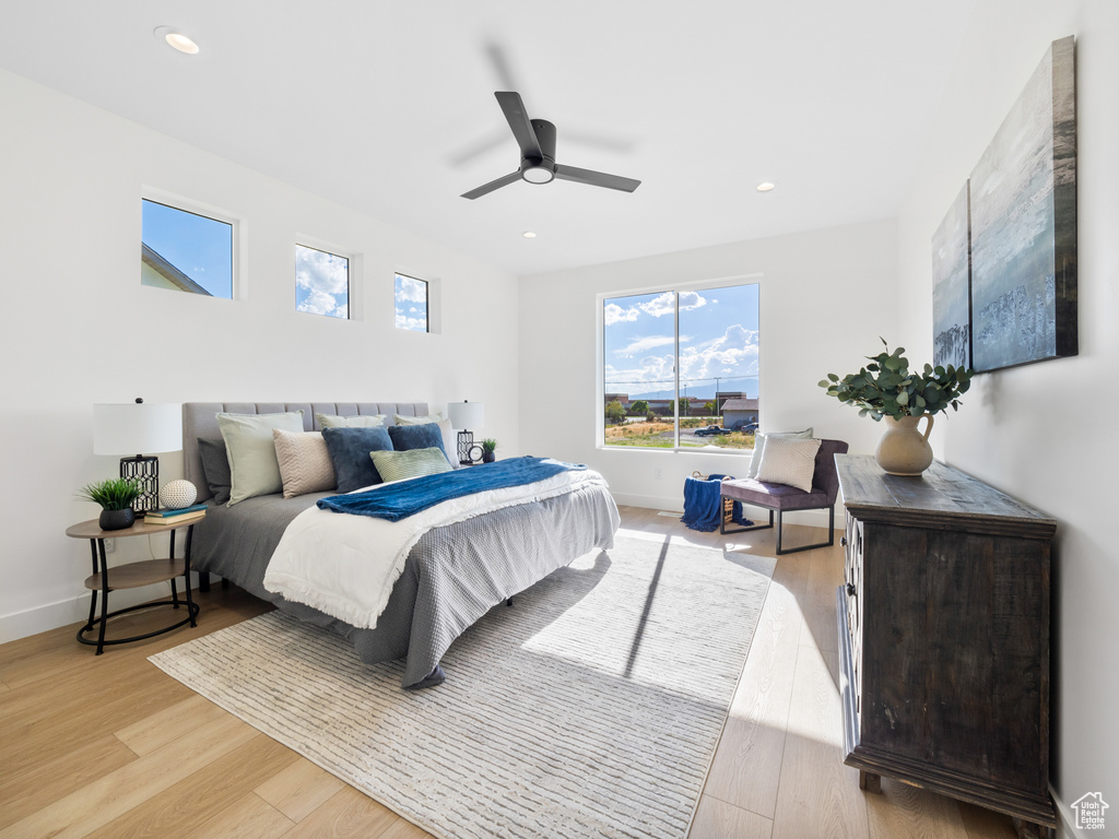 Bedroom with light wood-type flooring and ceiling fan